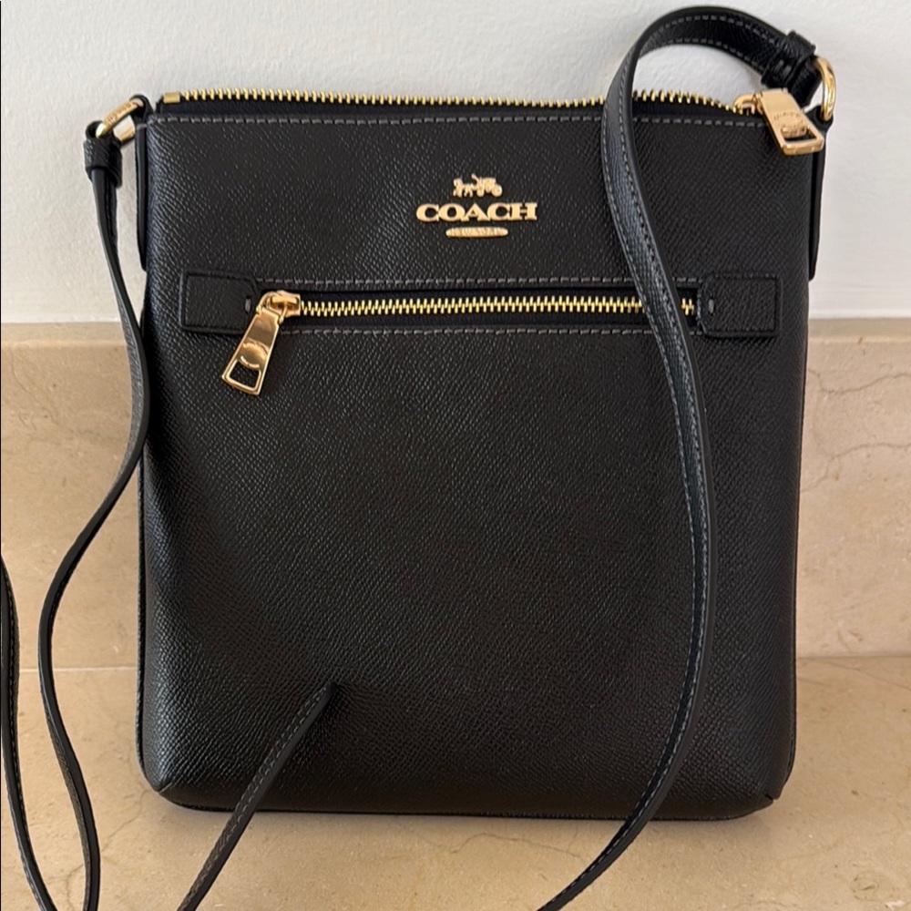 Coach Black and Gold Crossbody Bag Sleek Design